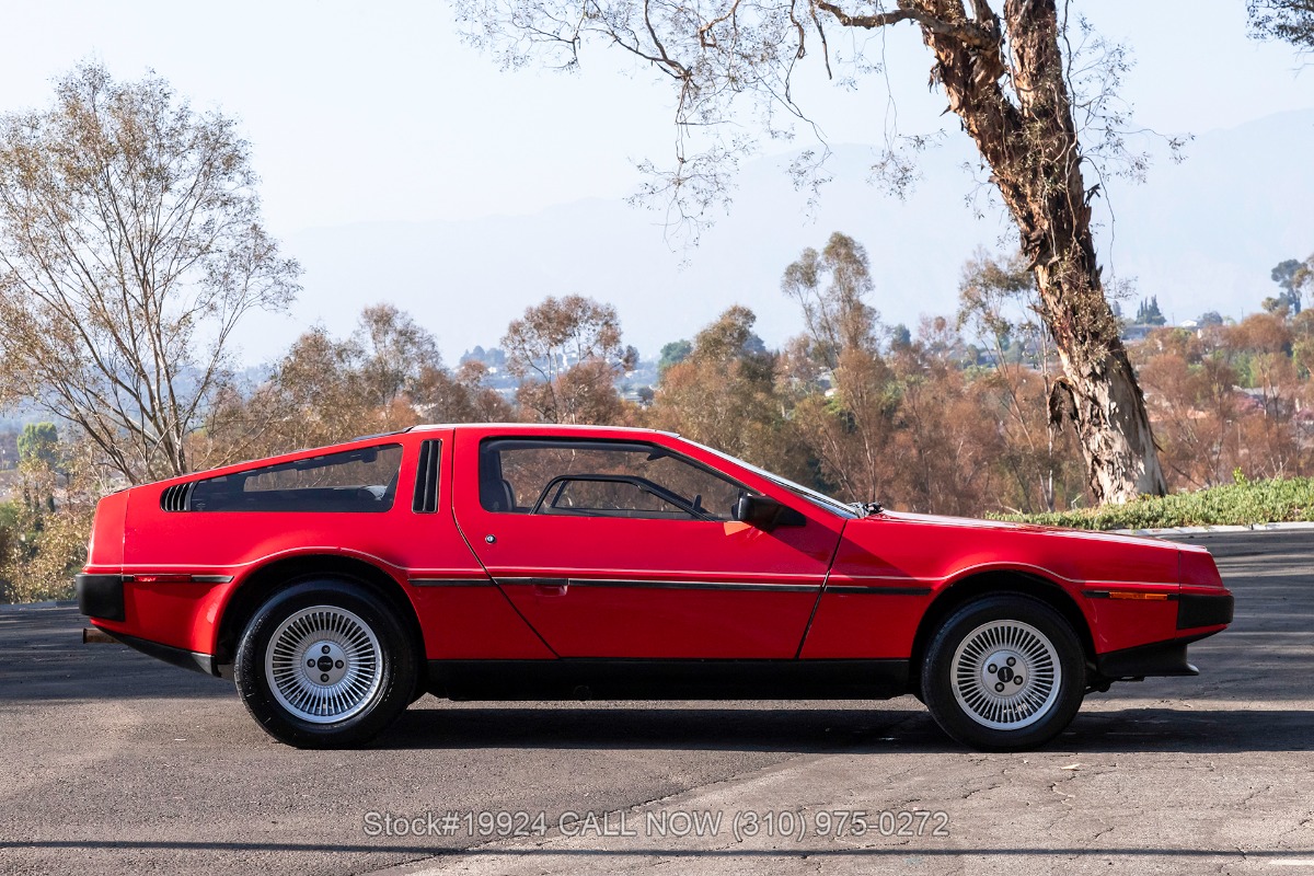 Red DeLorean DMC-12 side profile